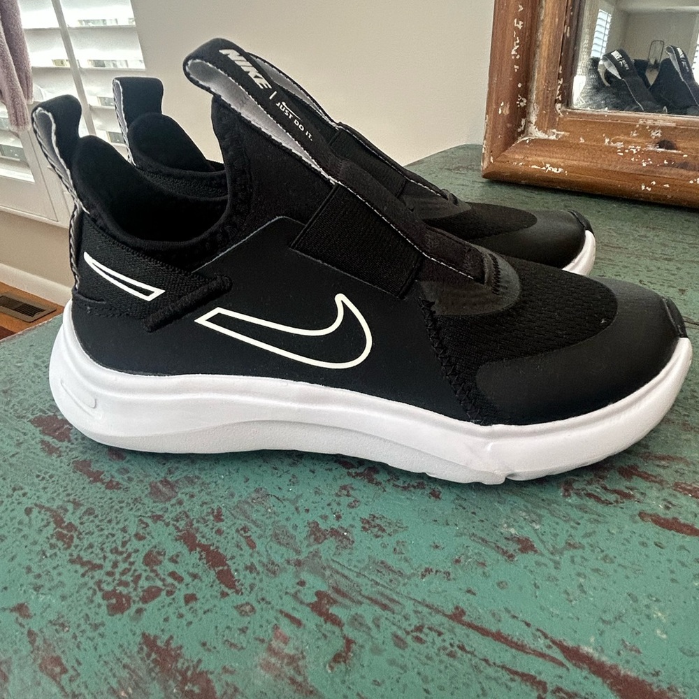 Kids Nike Black and White Flex Plus Slip on Sneaker